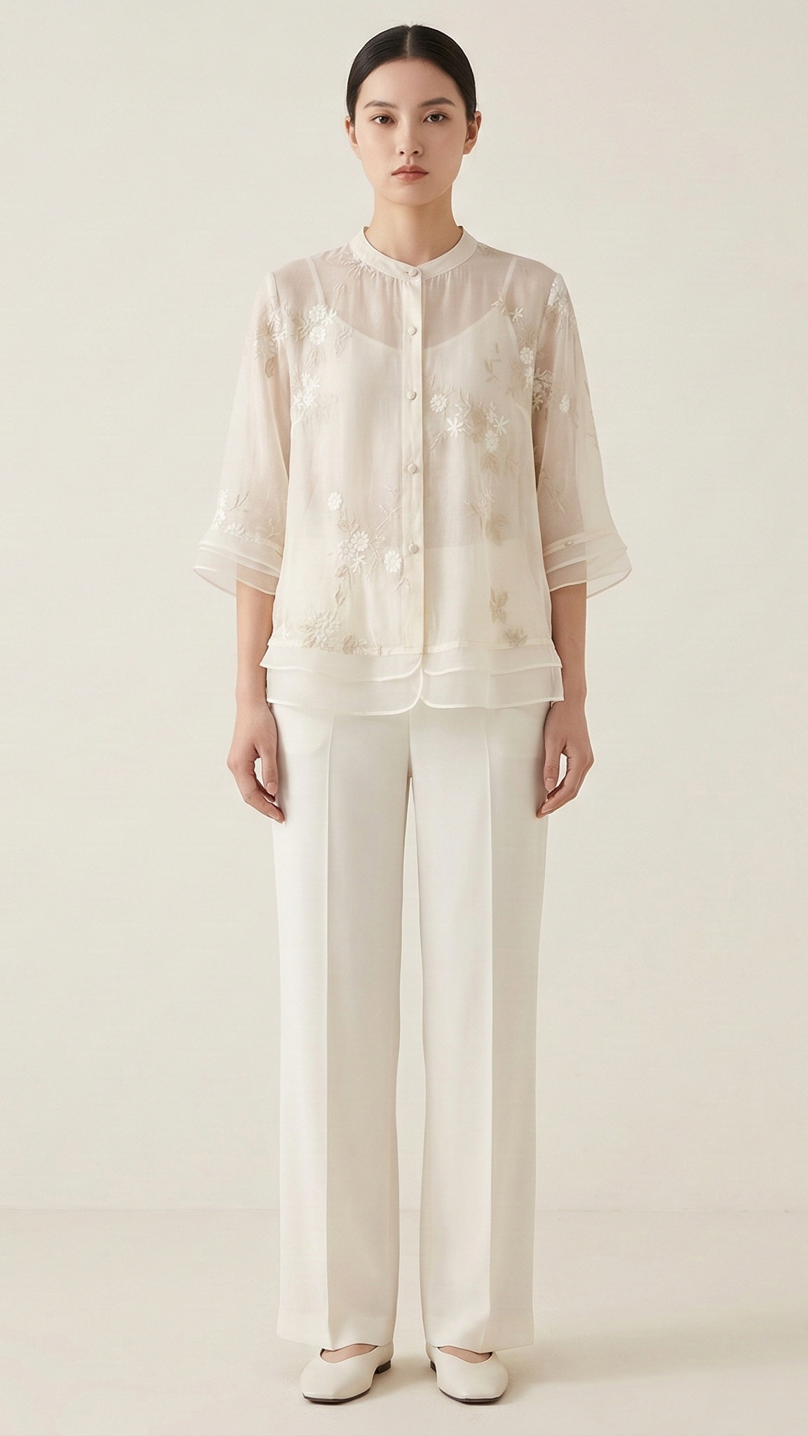 Top femme broderie florale manches longues
