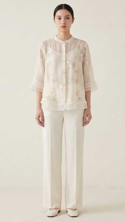 Top femme broderie florale manches longues